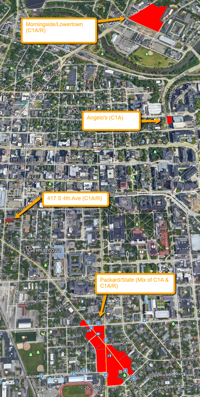 Satellite overhead image of a portion of Ann Arbor with parcels zoned as C1A and C1A/R highlighted in red