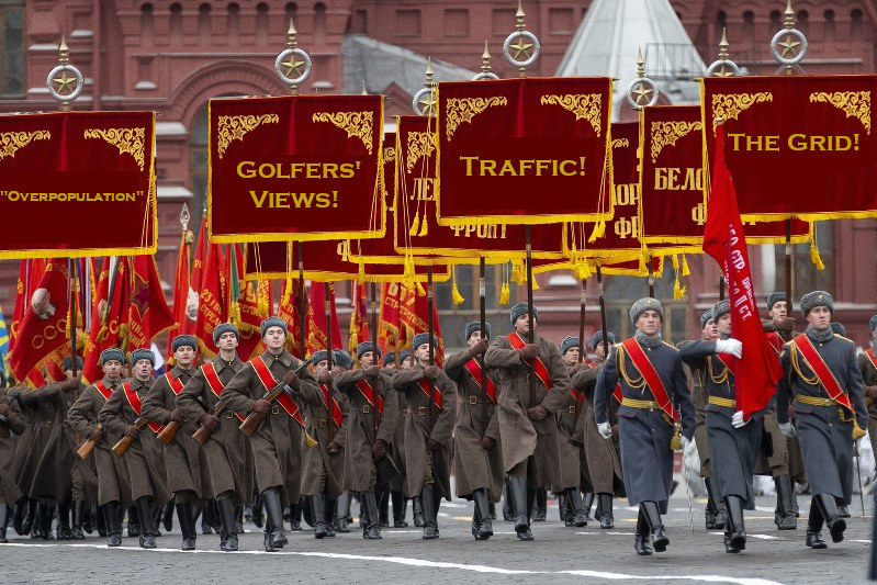Photo of a Soviet parade with anti-housing arguments superimposed on the banners